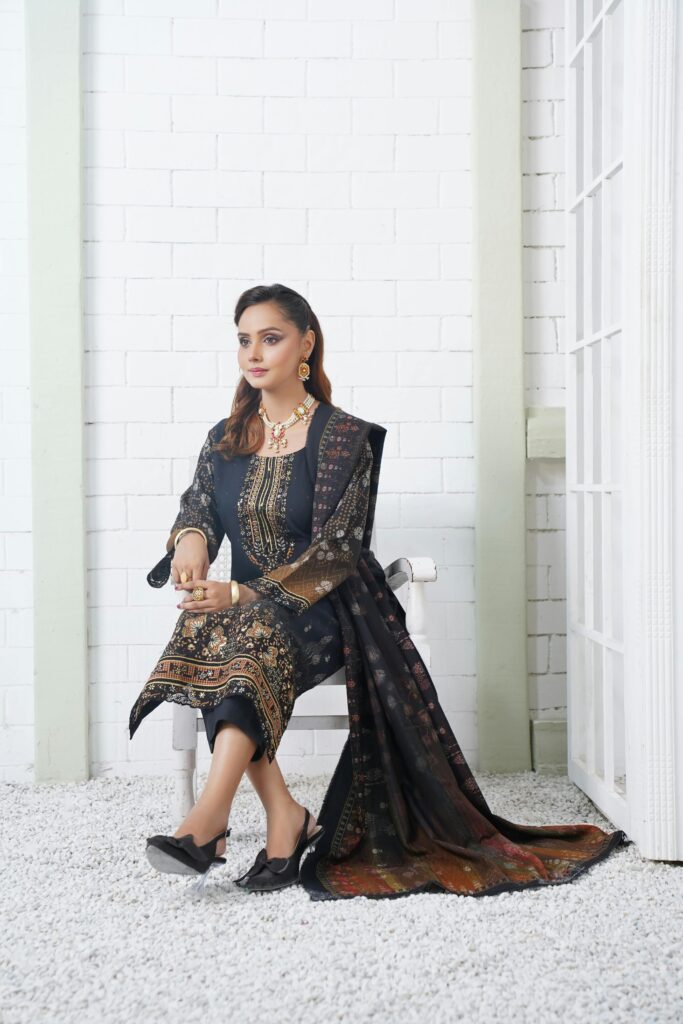 An elegant portrait of a fashion model in traditional Pakistani attire photographed in Lahore.